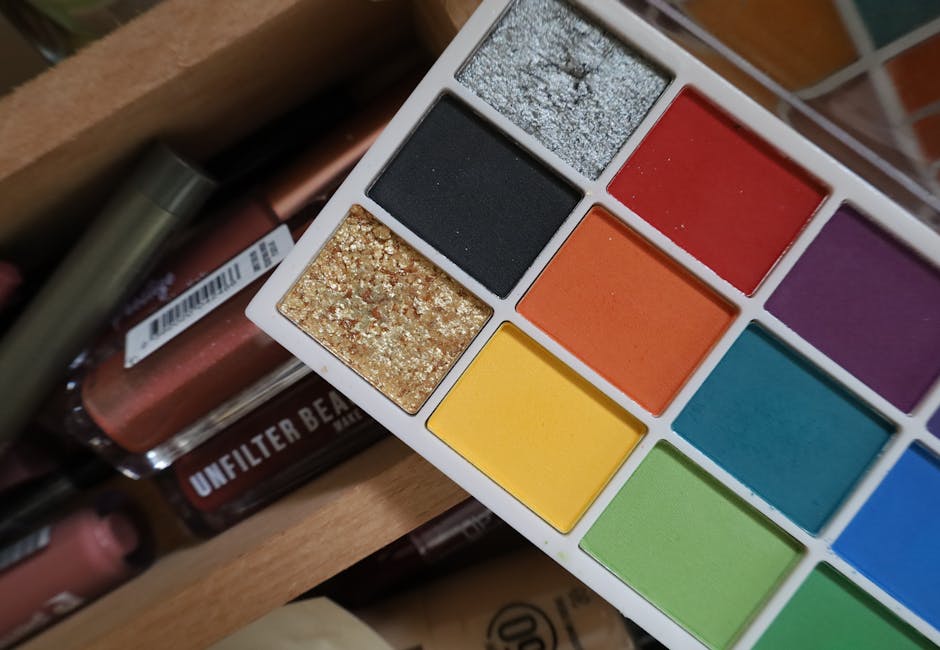 Vibrant makeup palette with various colorful shades, perfect for creative looks.